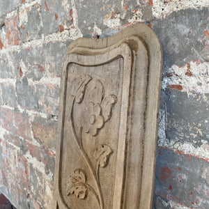 Carved wooden floral panel