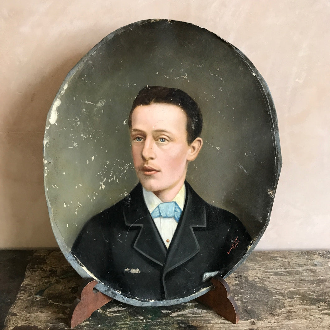 Oil portrait mounted on tin