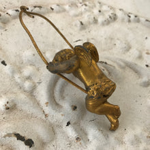Load image into Gallery viewer, Small bronze cherub/putti on swing
