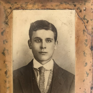 Portrait mounted on metal plate - young man