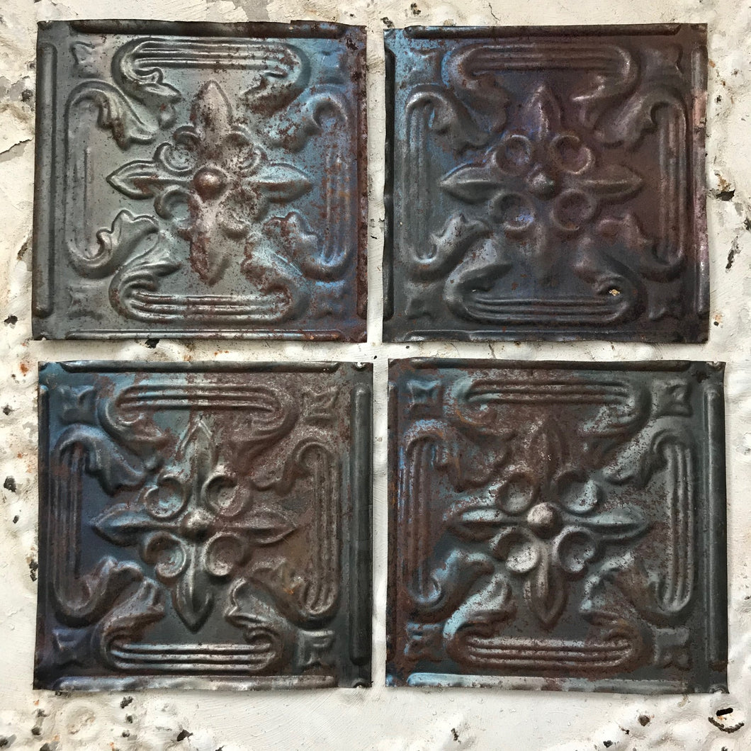 Set of 4 tin tiles