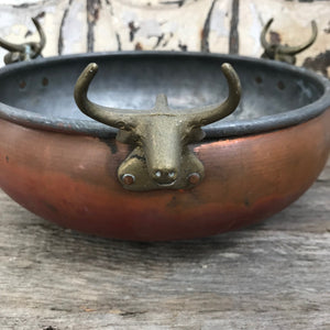 Copper bowl with bulls head decor
