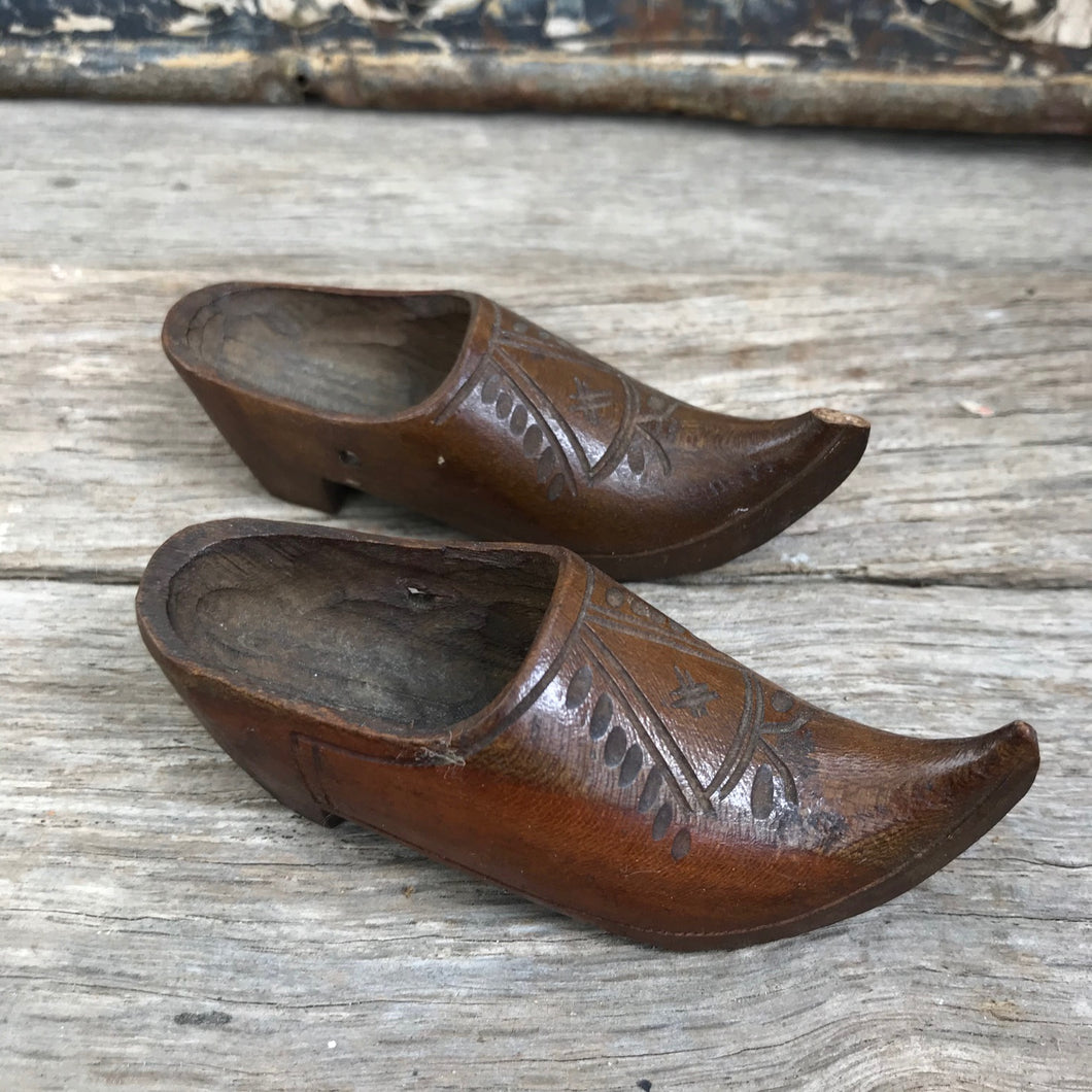 Small carved clogs