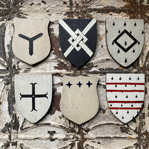 Set of 6 painted wooden family crests