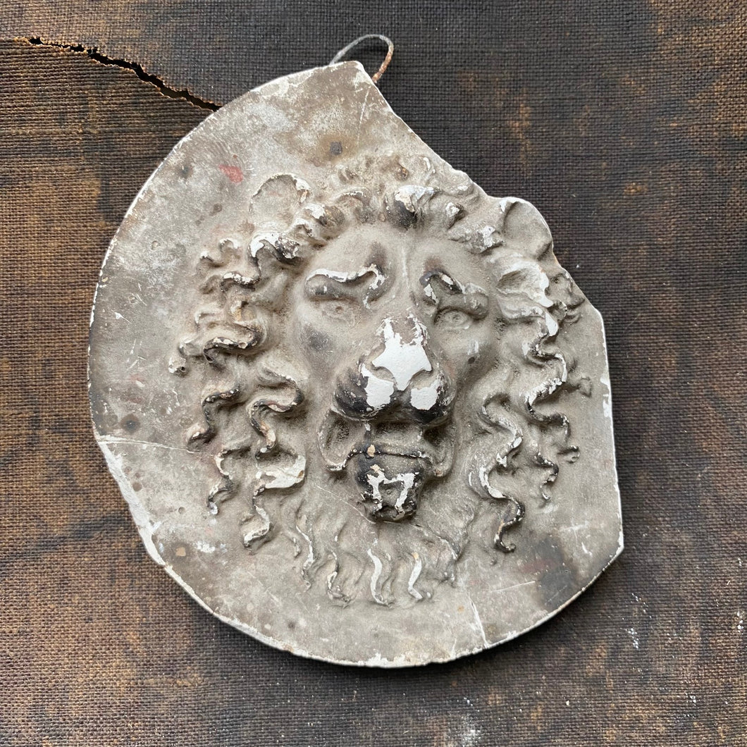 Plaster wall hanging lion's face