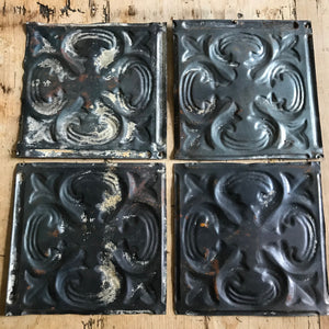 Set of 4 tin tiles